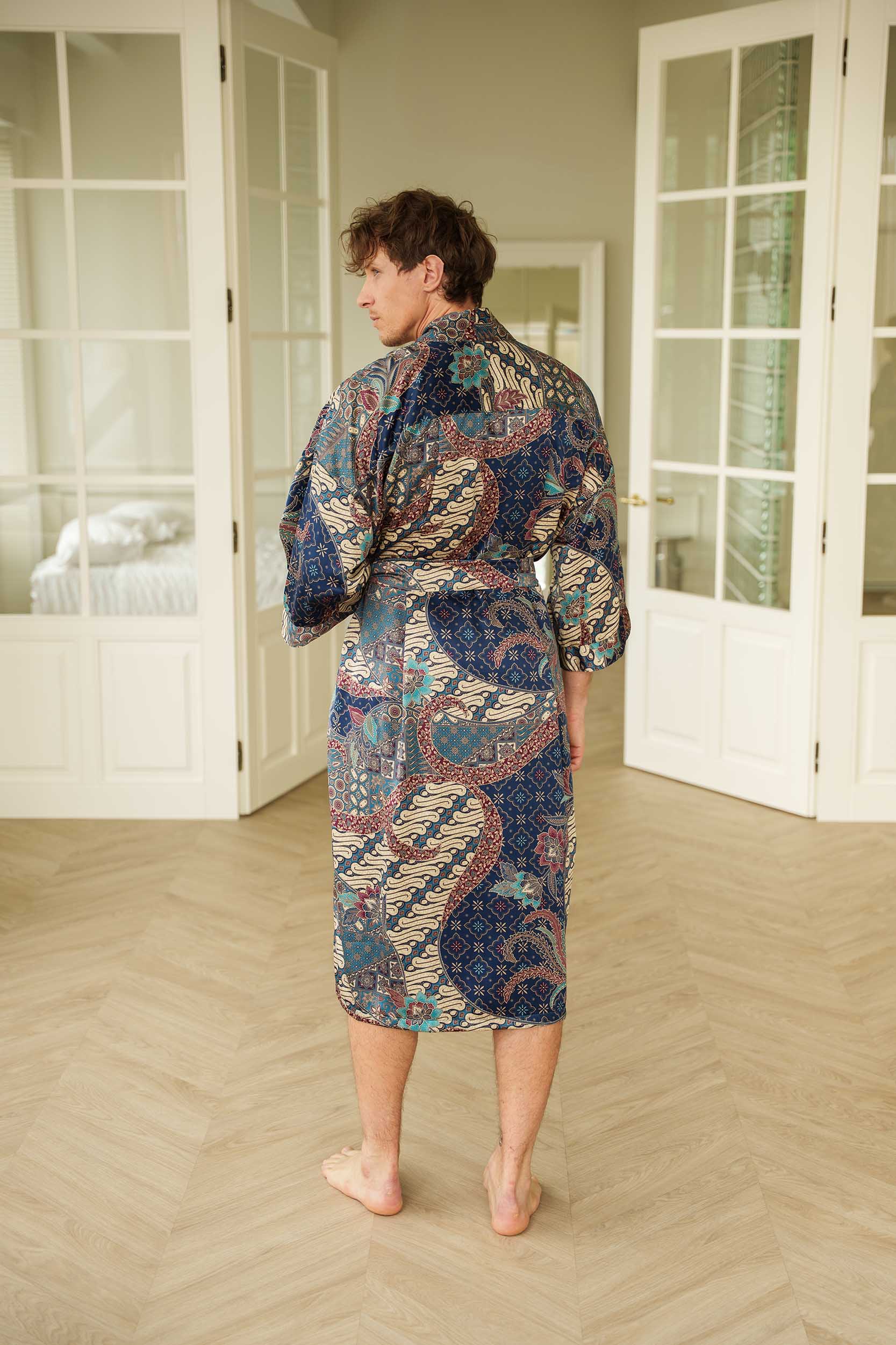 Back view of Angkasa men’s kimono robe – elegant navy satin with turquoise and burgundy batik design.