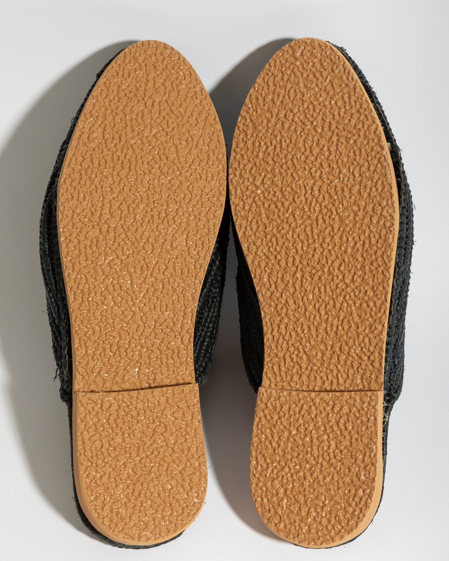 soles of raffia sandals