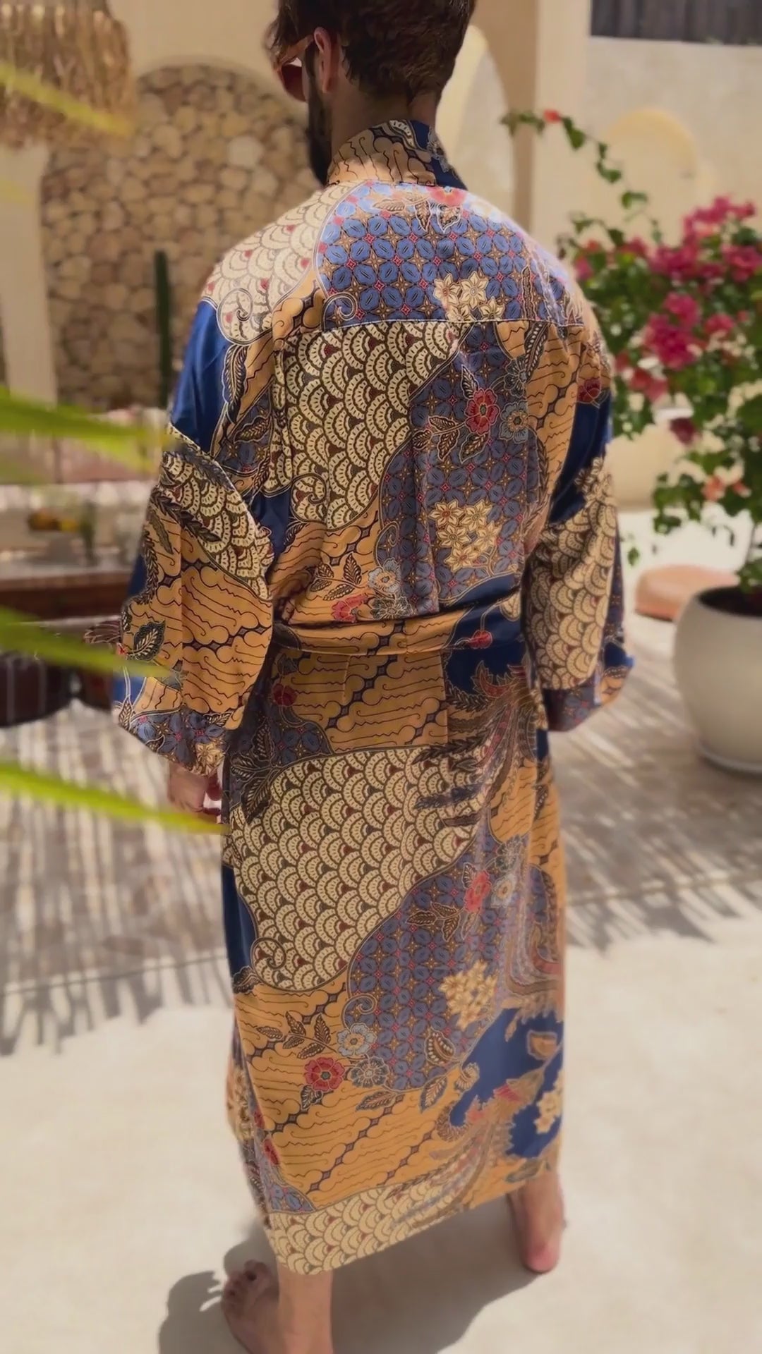 man wearing satin kimono robe nilam handmade in Bali