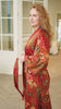 woman wearing red satin kimono robe handmade in Bali