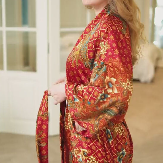 woman wearing red satin kimono robe handmade in Bali