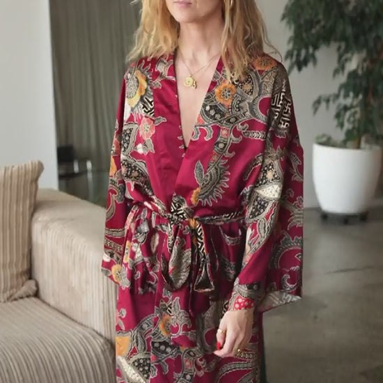 woman wearing cherry red satin kimono robe Sekar