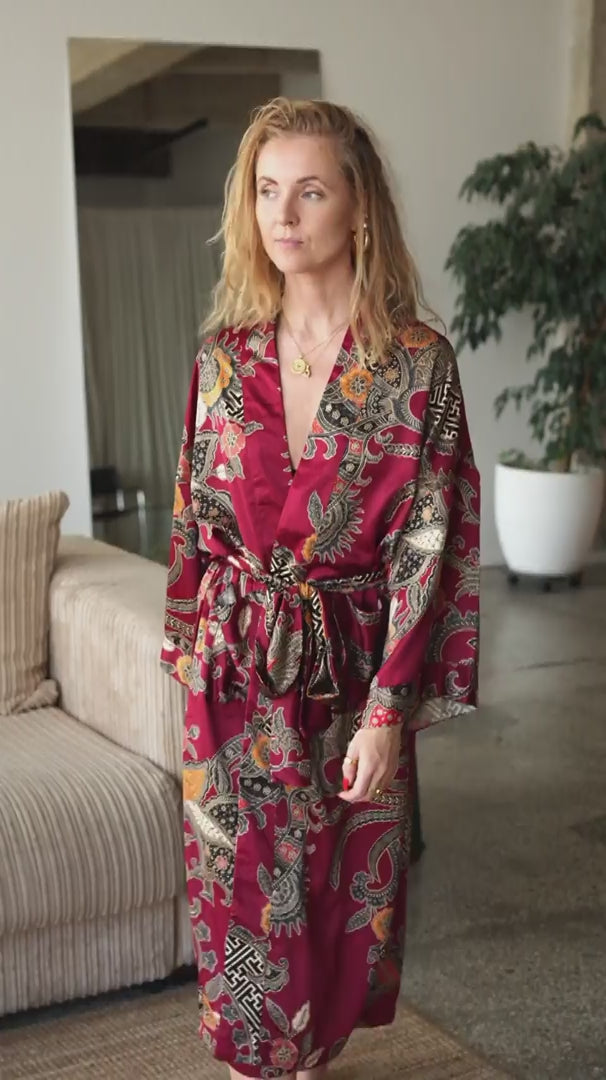 woman wearing cherry red satin kimono robe Sekar