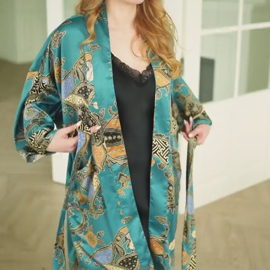 woman wearing satin teal kimono robe handmade in bali