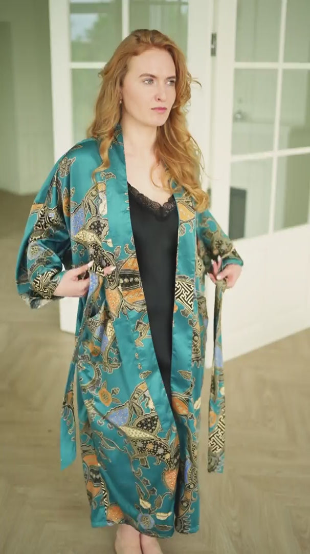 woman wearing satin teal kimono robe handmade in bali