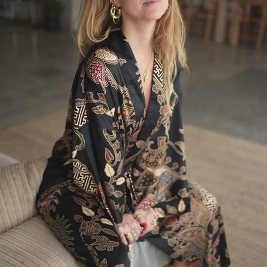 woman wearing satin kimono robe handmade in bali - Malam black