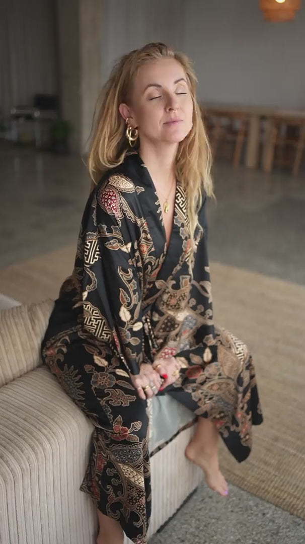 woman wearing satin kimono robe handmade in bali - Malam black
