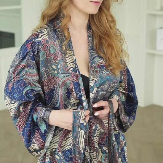 woman wearing blue satin kimono robe Angkasa