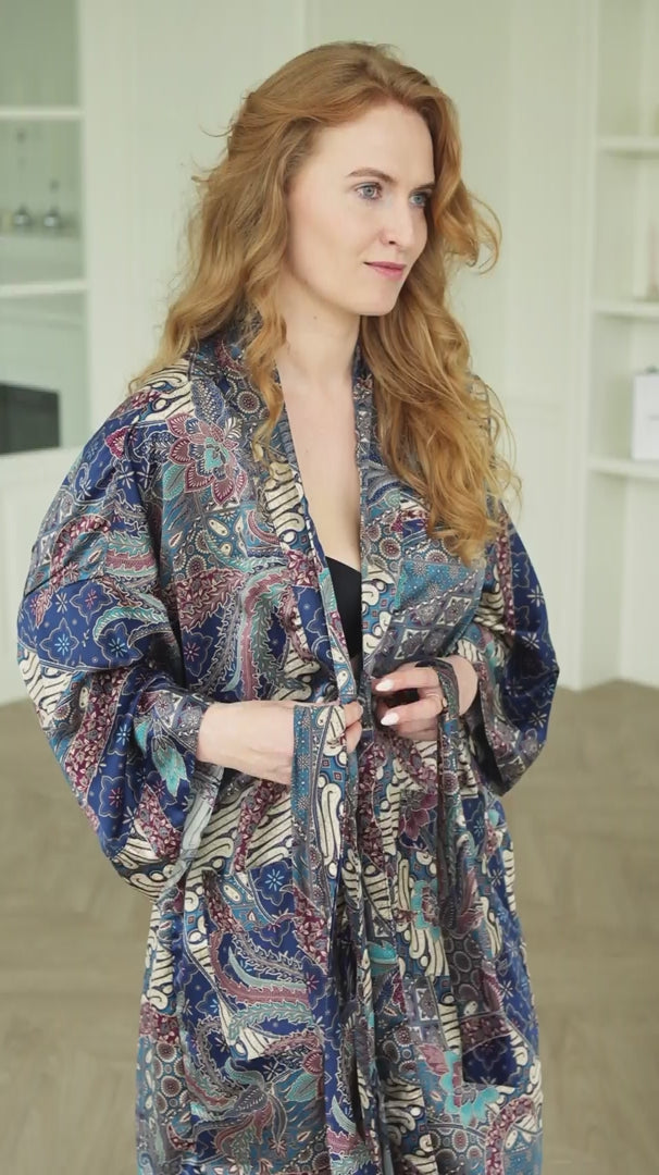woman wearing blue satin kimono robe Angkasa