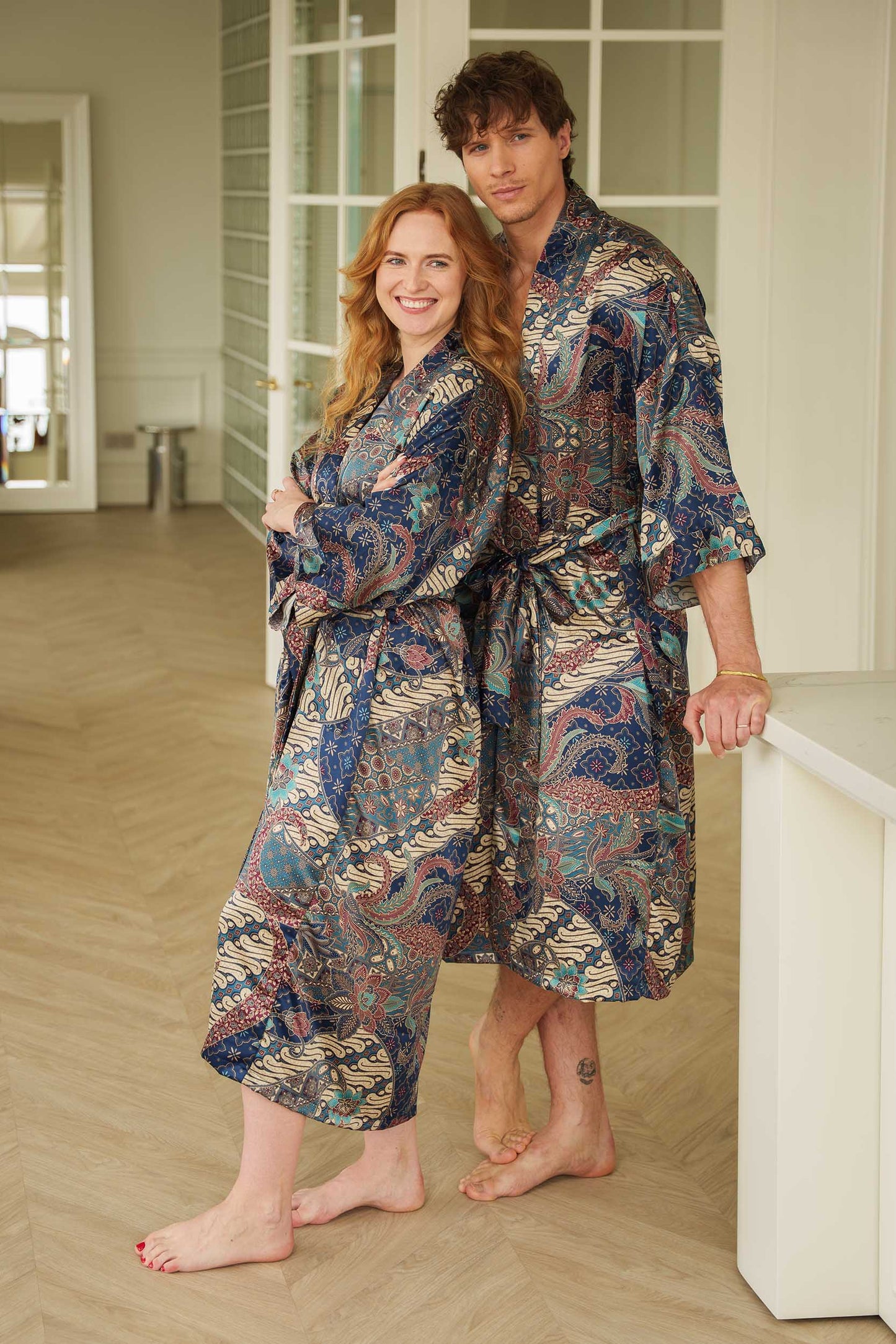 Couple wearing Toré Angkasa kimono robes handmade in Bali.