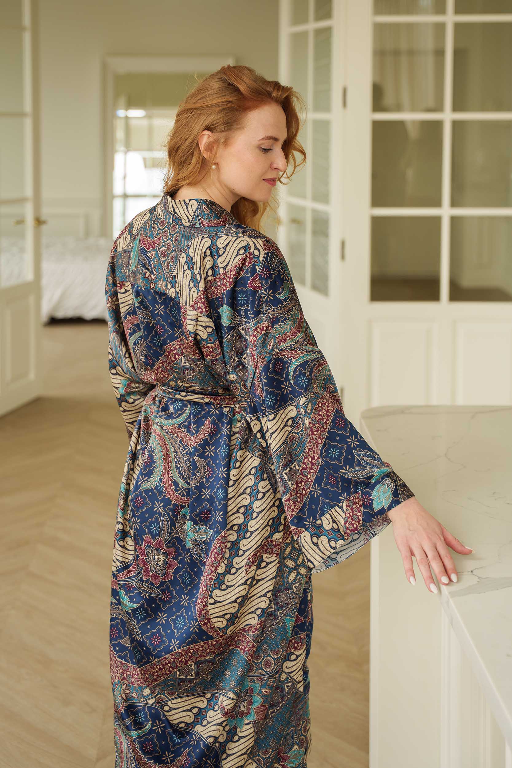 Back view of Toré Angkasa women’s kimono robe – elegant night-sky batik design in navy and turquoise tones.