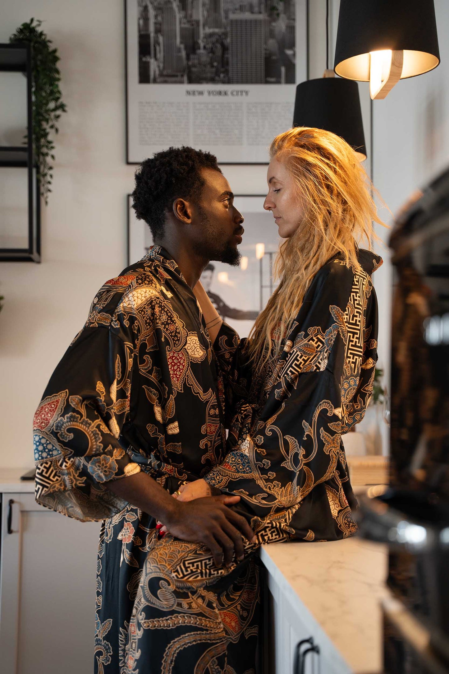 Man and woman in Toré Malam robes – elegant couple kimono robes inspired by the tranquility of night.