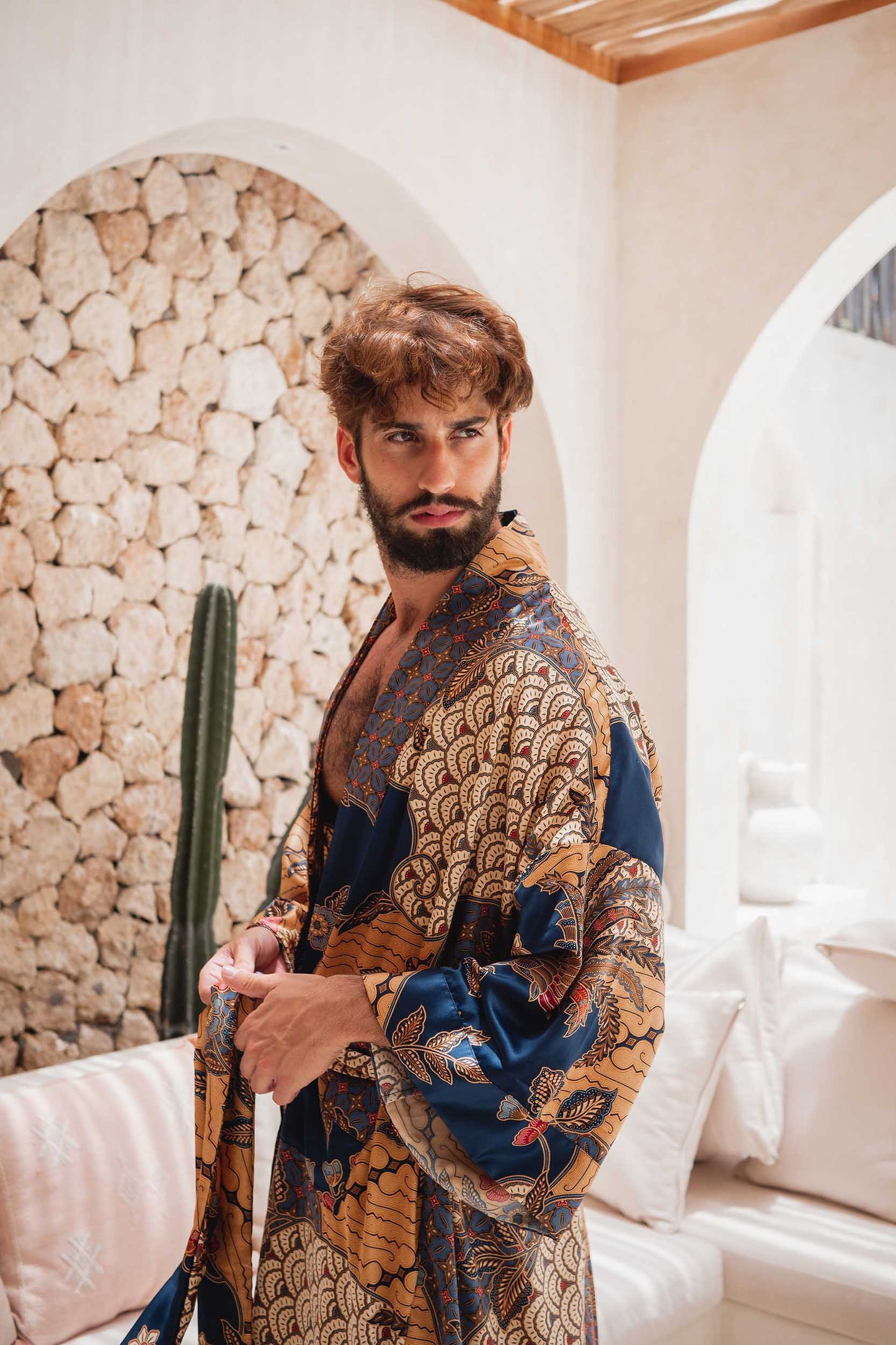 Side view of Toré Nilam robe – men’s luxury satin kimono with Indonesian-inspired design.