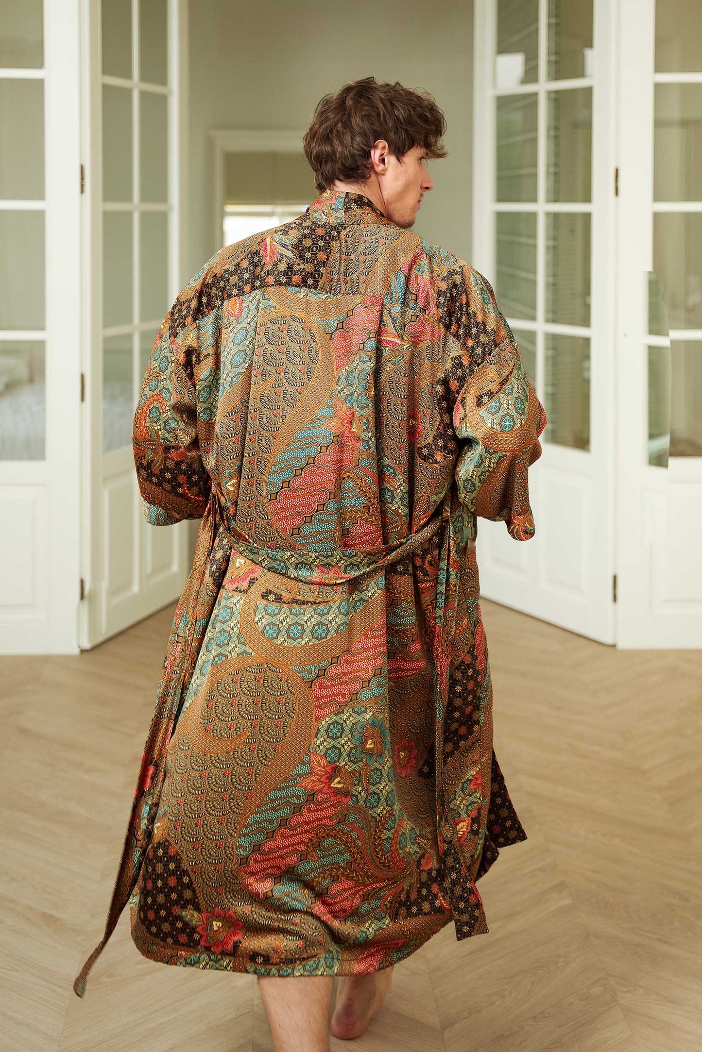 Back view of Toré Semesta men’s kimono robe – elegant cosmic-inspired batik pattern.
