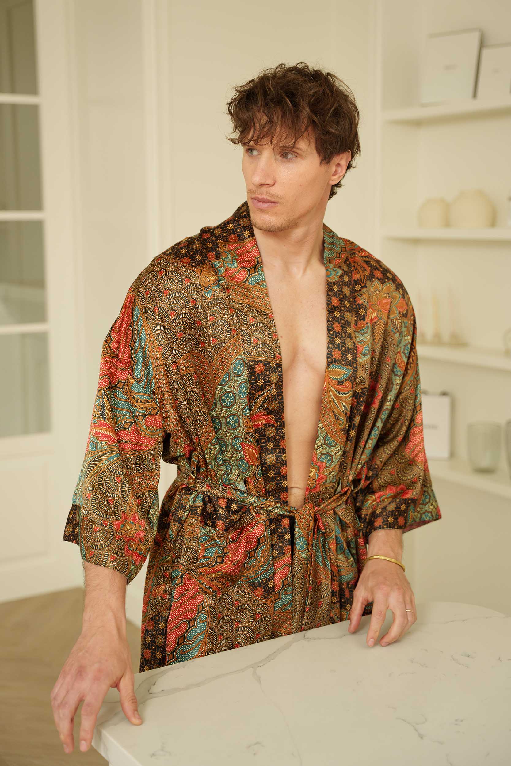 Man wearing Toré Semesta kimono robe – luxury dressing gown.