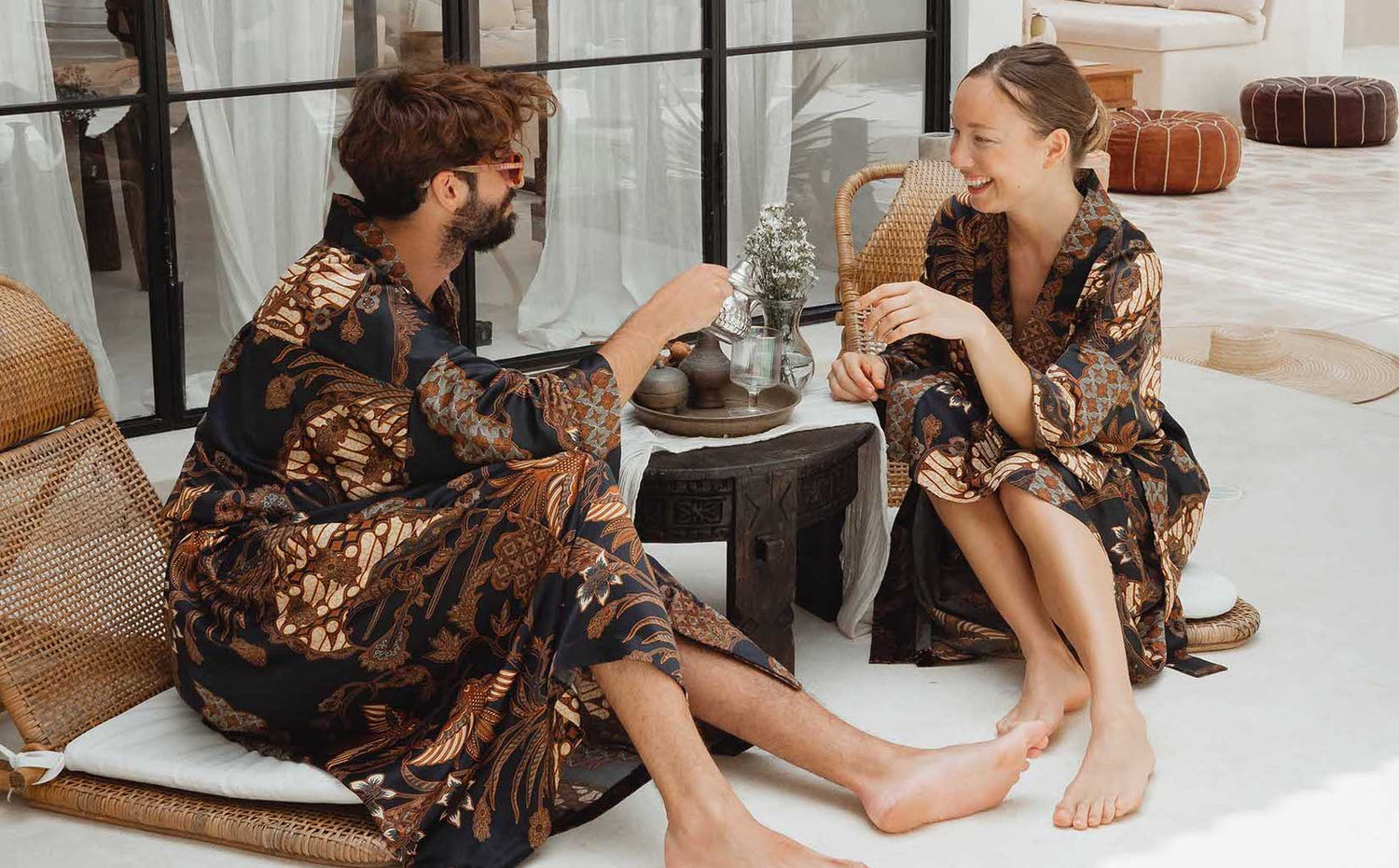 Man and woman wearing kimono robes handmade in Bali